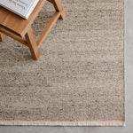 Cable Rug by Armadillo, handwoven from a luxurious mix of Italian and Argentinian wools, featuring a chevron pattern created through a traditional soumak weave, with fine cotton fringe edges, available in colors like Calico, Chambray, Seed, Jade, and Bisque, and sizes ranging from 1.7 x 2.4m to 3 x 4m.