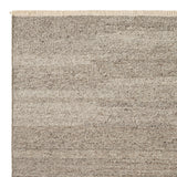 Cable Rug by Armadillo, handwoven from a luxurious mix of Italian and Argentinian wools, featuring a chevron pattern created through a traditional soumak weave, with fine cotton fringe edges, available in colors like Calico, Chambray, Seed, Jade, and Bisque, and sizes ranging from 1.7 x 2.4m to 3 x 4m.
