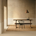 Mojave Rug by Armadillo, hand-knotted from 100% natural jute using an Indo-Nepalese Tibetan weaving technique, available in Cashew, Laurel Green, and Natural colors, featuring a unique textured finish that adds warmth and character to interiors.