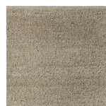 Pebble Rug by Armadillo, hand-knotted from undyed European wool using an Indo-Nepali technique, featuring a chunky weave reminiscent of cozy knitwear, available in the color Foal, offering a plush, textural pile that adds warmth and character to interiors.