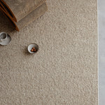 Pebble Rug by Armadillo, hand-knotted from undyed European wool using an Indo-Nepali technique, featuring a chunky weave reminiscent of cozy knitwear, available in the color Foal, offering a plush, textural pile that adds warmth and character to interiors.