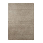 Thatch Rug by Armadillo, hand-knotted with a light pile of refined Persian knots, available in four mineral tones—Concrete, Dew, Marsh, and Pink Salt—and various sizes, crafted from 100% wool with a 100% cotton weft and warp, offering an industrial yet elegant aesthetic.