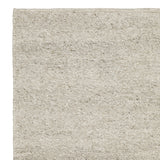 Close-up van de textuur van het Aspen vloerkleed met lineaire soumak-weving