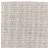 Detail of cross-hatched texture in the natural wool Winnow rug – durable and artisan-made