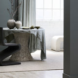 Artisan-crafted Winnow rug made from natural wool – minimal flatweave design