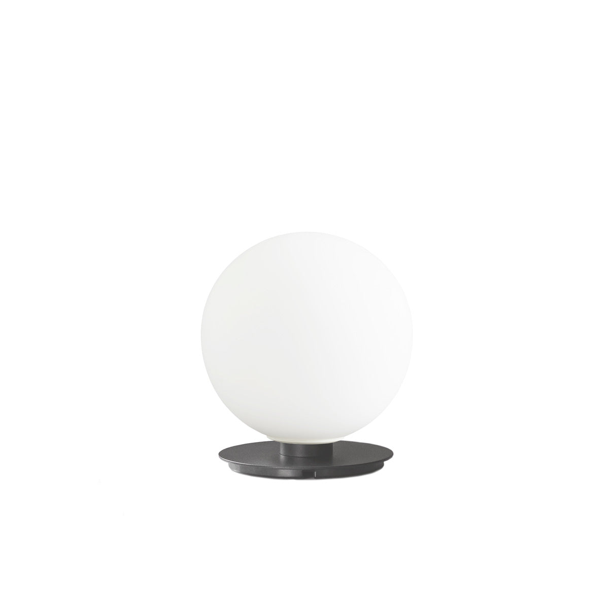 TR Bulb Wall Lamp by Audo Copenhagen – Designed by Tim Rundle, this minimalist wall lamp features a dimmable LED bulb encased in a hand-blown opal glass diffuser, mounted on a sleek metal bracket. Available in finishes such as matte black, polished steel, and brushed brass, providing soft, ambient lighting suitable for various interior styles.