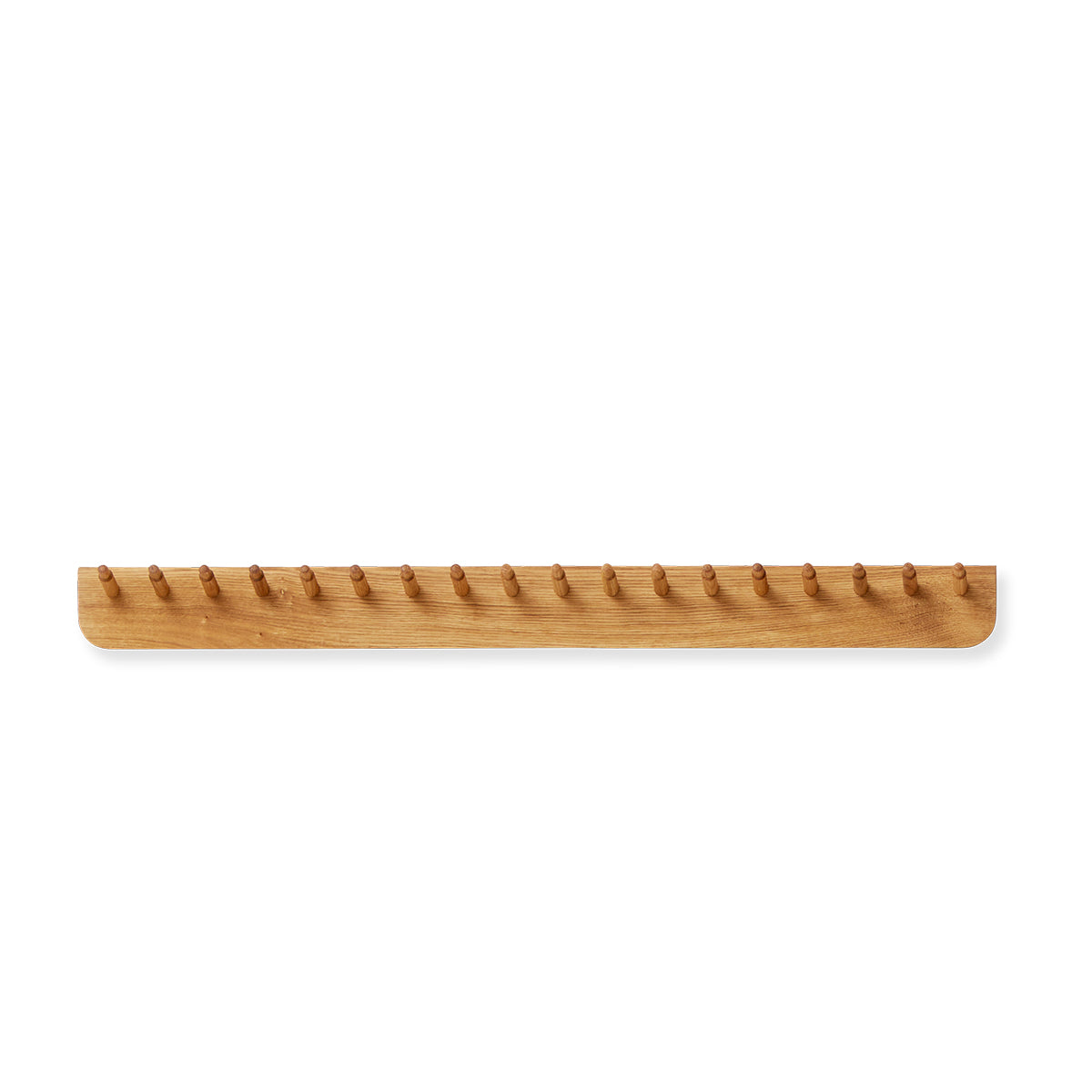 Echo Coat Rack by Form & Refine, crafted from solid European oak, featuring curved pegs and a sturdy backrest, available in natural oak finish, designed for hanging coats, hats, and scarves in hallways or entryways.