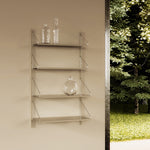 Frama Shelf Library wall-mounted shelving unit with metal brackets and adjustable shelves. Stainless steel