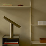 Frama Shelf Library wall-mounted shelving unit with metal brackets and adjustable shelves. Warm white steel