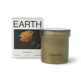 Homework Earth Scented Candle – 180g – A 100% natural candle handcrafted in the UK, featuring a silky blend of rapeseed and coconut wax. Fragranced with responsibly-sourced essential oils, this candle offers a scent profile of floral, earth, spice, and musk. Housed in a warm-toned lidded glass jar that can be reused after the candle has burned down. Palm-free and vegan. Burn time: 35–40 hours.