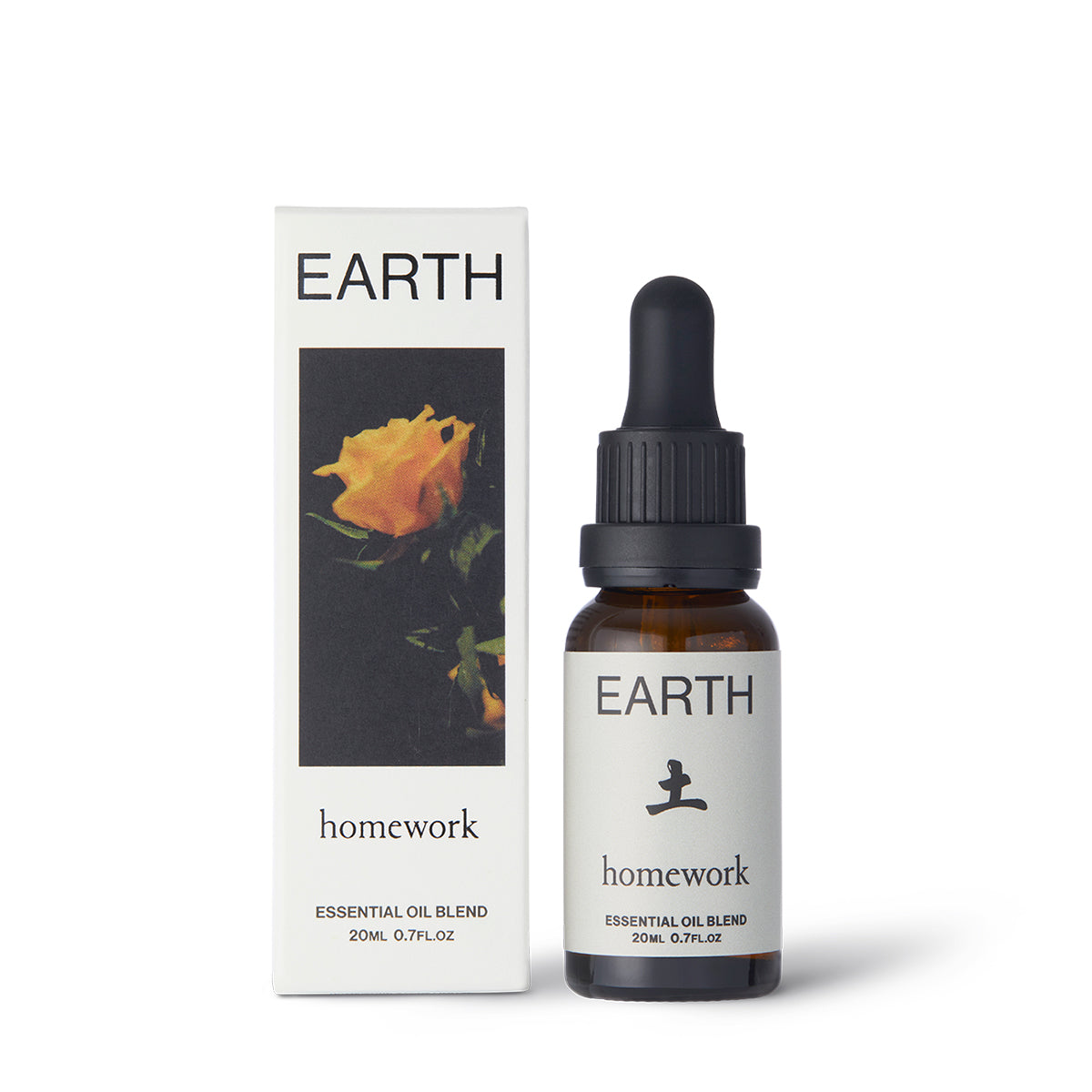 Homework Earth Essential Oil Blend – 20ml – A 100% natural, responsibly-sourced essential oil blend crafted in London, inspired by the stability and grounding nature of the Earth element. Features a scent profile of floral, earthy, spicy, and musky notes, with ingredients like cedarwood, geranium, cardamom, patchouli, black pepper, Siberian fir, lavender, and elemi oils. Ideal for use in diffusers or oil burners to create a calming and balanced atmosphere.
