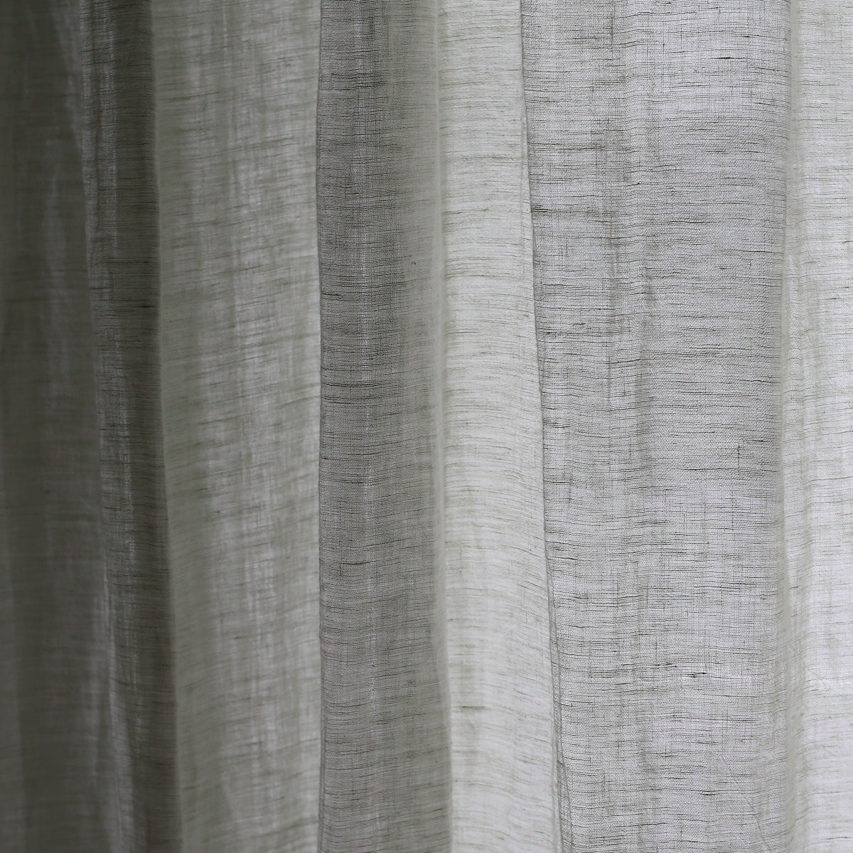 By Mölle's Sheer Linen Curtain 110 gr/m², crafted from open-weave linen woven in Italy, offers a soft, translucent texture that beautifully diffuses light. The fabric's width of 320 cm allows for seamless panels, enhancing the natural ambiance of your space. Available in seven subtle shades, this curtain can be customized with single pleats or wave pleats. Pre-washed for a soft touch and nice drape, it brings a timeless, natural look to any room.