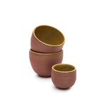 Handthrown Ceramic Cup by Carien Kuypers van Dongen, crafted from stoneware with a matte glaze made from pigments sourced from IJssel clay, available in espresso and cappuccino sizes, each piece uniquely handcrafted.