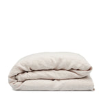 Linen duvet cover in Alabaster by By Mölle – 100% pre-washed European linen with a chambray weave of creamy beige and off-white yarns, featuring a soft, neutral shade with pale pink undertones, available in various sizes and closure options.