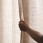 By Mölle's Sheer Linen Curtain 110 gr/m², crafted from open-weave linen woven in Italy, offers a soft, translucent texture that beautifully diffuses light. The fabric's width of 320 cm allows for seamless panels, enhancing the natural ambiance of your space. Available in seven subtle shades, this curtain can be customized with single pleats, wave pleats, or a rod pocket. Pre-washed for a soft touch and nice drape, it brings a timeless, natural look to any room.