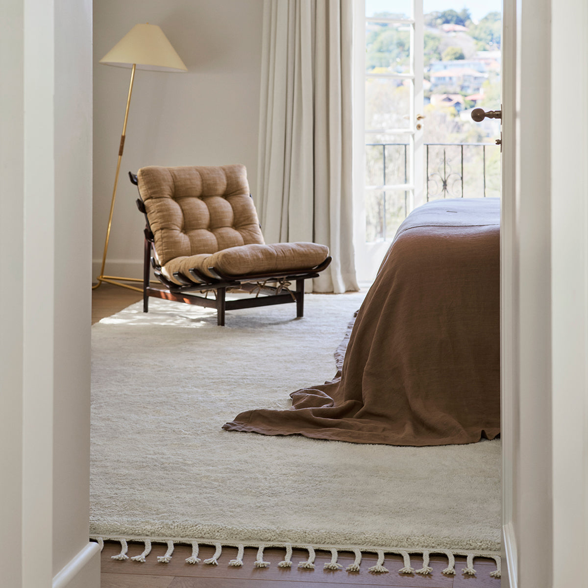 Petra Rug by Armadillo, hand-knotted from pure wool, available in various neutral tones, featuring a subtle texture and minimalist design that adds warmth and elegance to any interior.
