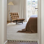 Petra Rug by Armadillo, hand-knotted from pure wool, available in various neutral tones, featuring a subtle texture and minimalist design that adds warmth and elegance to any interior.