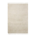 Petra Rug by Armadillo, hand-knotted from pure wool, available in various neutral tones, featuring a subtle texture and minimalist design that adds warmth and elegance to any interior.
