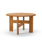 Mio Dining Table by Thorup Copenhagen featuring a minimalist round design crafted from FSC-certified solid oak, available in oiled or stained finishes, with distinctive steel fasteners and an organic silhouette