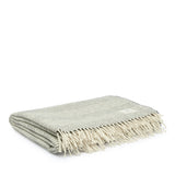 Alpaca Stripes Blanket by By Mölle – 100% alpaca wool woven in an off-white base with black stripes. Handcrafted by a family-run company in Ireland, this blanket is incredibly warm without being heavy. Ideal for cozying up on cold winter days.