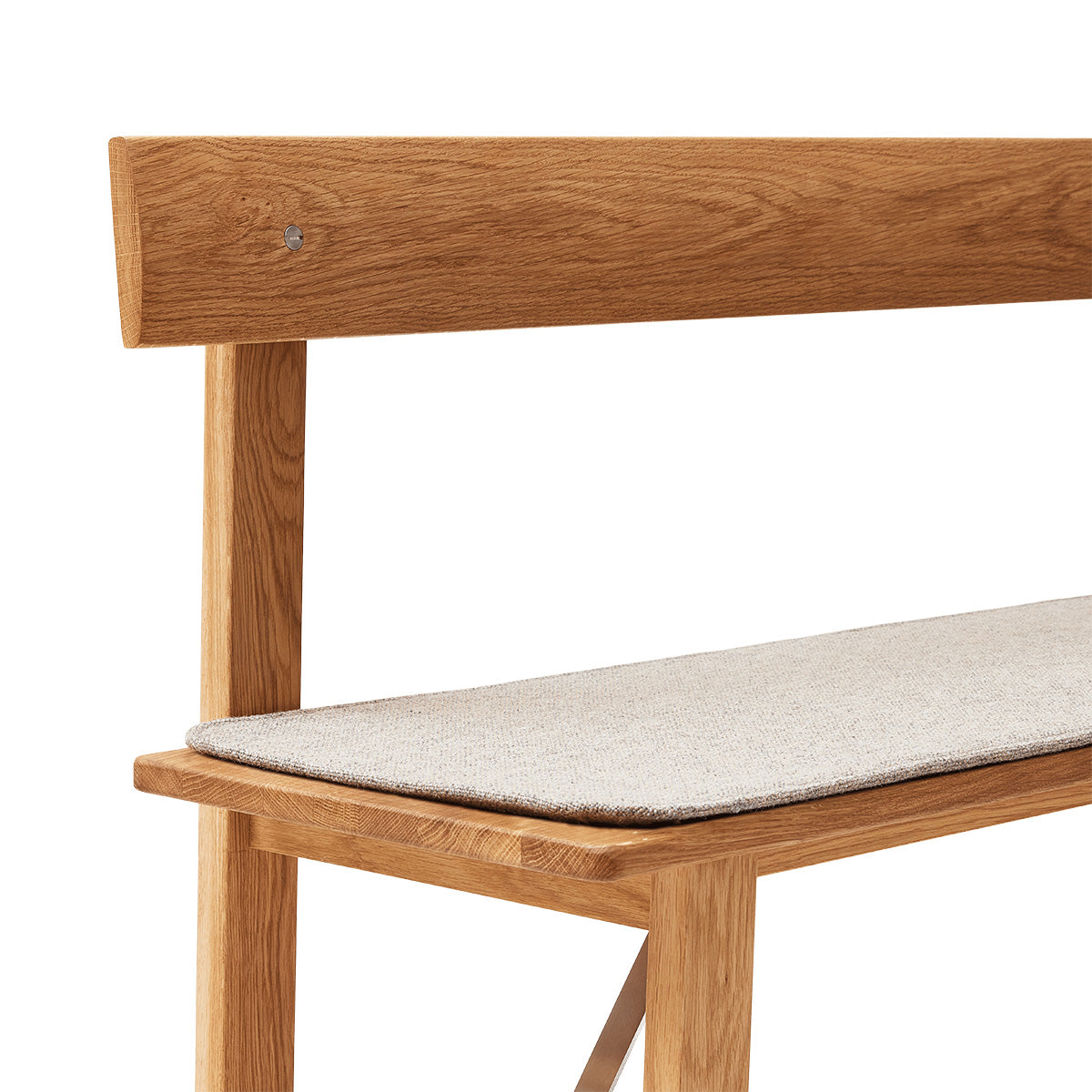 Wooden chair with a cushion on a white background