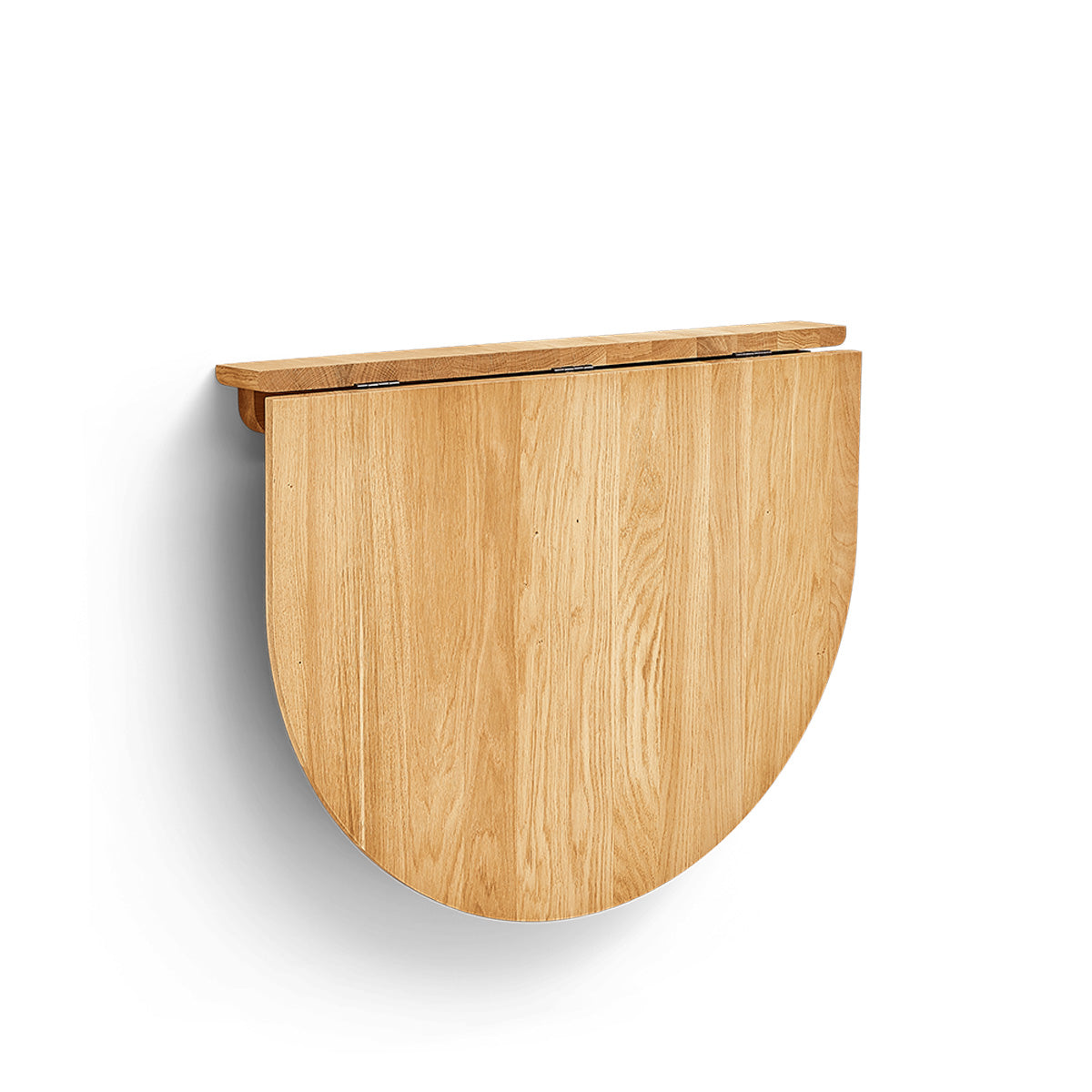 Minimalistische inklapbare wandtafel van massief eikenhout met slank frame en onzichtbaar scharniermechanisme. Ovaal tafelblad dat je eenvoudig inklapt, perfect voor compacte ruimtes.