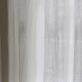 By Mölle's Sheer Linen Curtain 110 gr/m², crafted from open-weave linen woven in Italy, offers a soft, translucent texture that beautifully diffuses light. The fabric's width of 320 cm allows for seamless panels, enhancing the natural ambiance of your space. Available in seven subtle shades, this curtain can be customized with single pleats or wave pleats. Pre-washed for a soft touch and nice drape, it brings a timeless, natural look to any room.