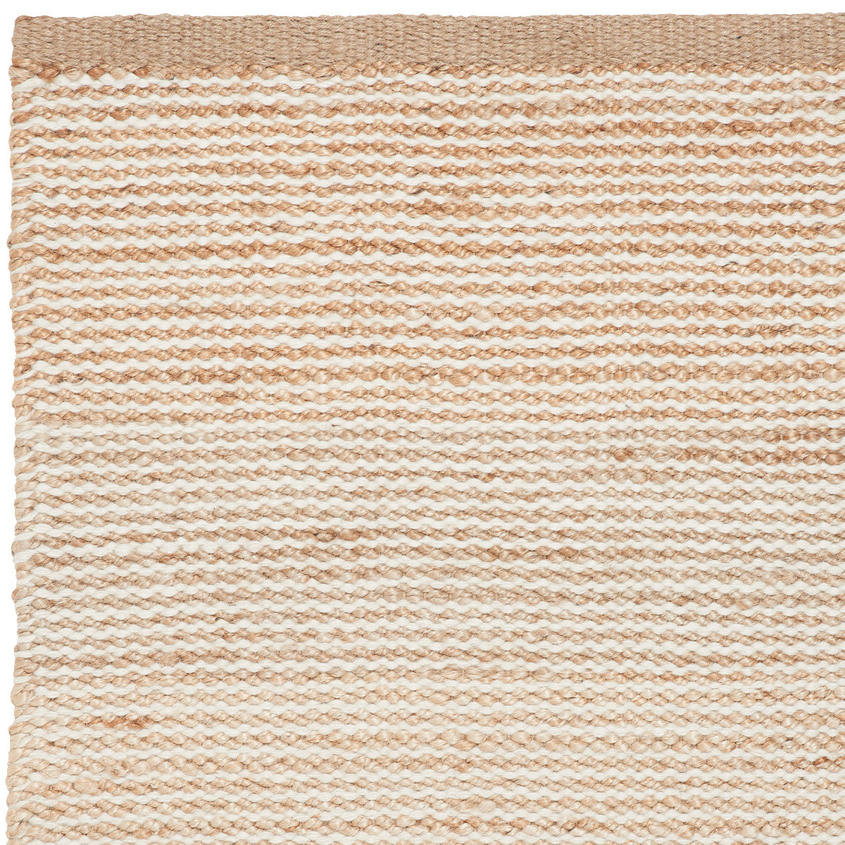 Close up natural and white rug