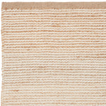 Close up natural and white rug