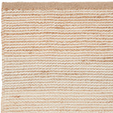 Close up natural and white rug