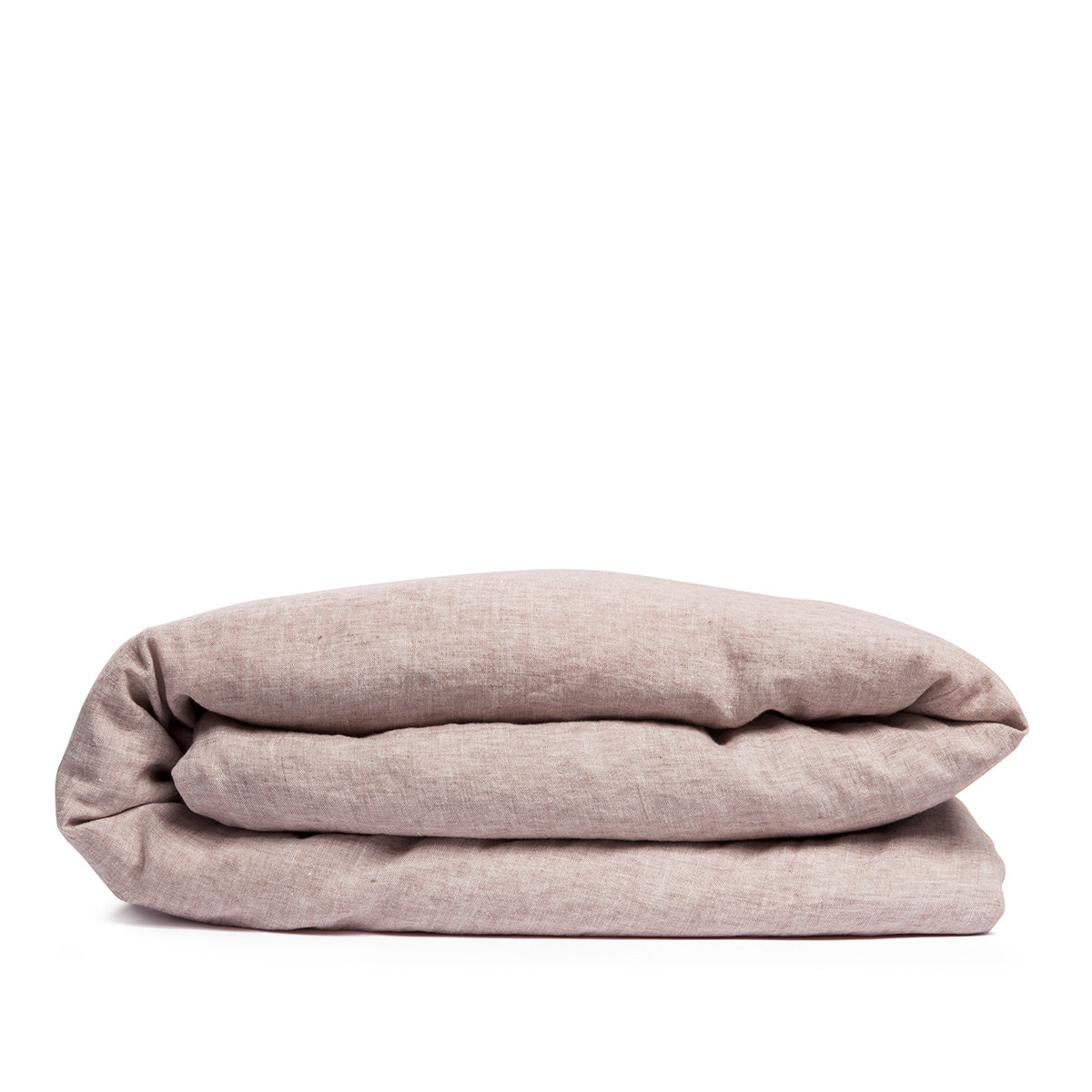 By Mölle's Pink Salt linen duvet cover, crafted from 100% pre-washed European flax linen, features a chambray weave combining pink and off-white threads. This warm pink hue adds a soft touch to any bedroom. The duvet cover is available with either wooden buttons or a tuck-in flap closure.