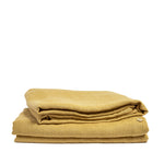 Geel linnen bedlaken