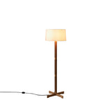 Floor lamp with a white shade on a white background