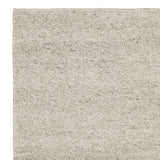 Close-up van de textuur van het Aspen vloerkleed met lineaire soumak-weving