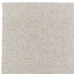 Detail of cross-hatched texture in the natural wool Winnow rug – durable and artisan-made
