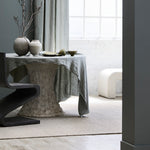 Artisan-crafted Winnow rug made from natural wool – minimal flatweave design