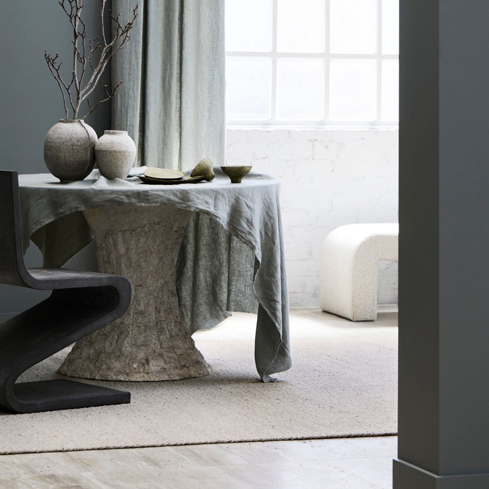 Artisan-crafted Winnow rug made from natural wool – minimal flatweave design
