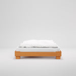 Cubico houten bed in licht amber.