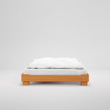Cubico houten bed in licht amber.