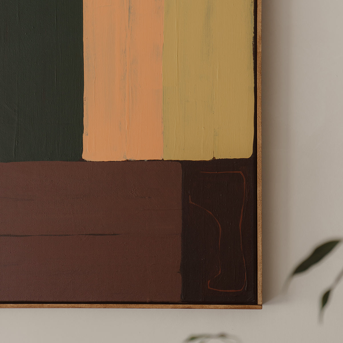 Close-up of a wooden frame with painted panels in various colors.