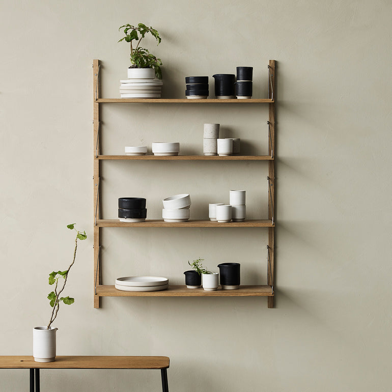 Frama Shelf Library collection with tableware