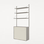Frama Shelf Library Canvas Cabinet – storage cabinet with canvas door, compatible with Frama Shelf Library wall-mounted shelving units. In the color stainless steel.