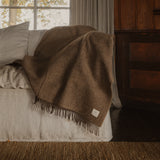 warme bruine wollen plaid van merino wol