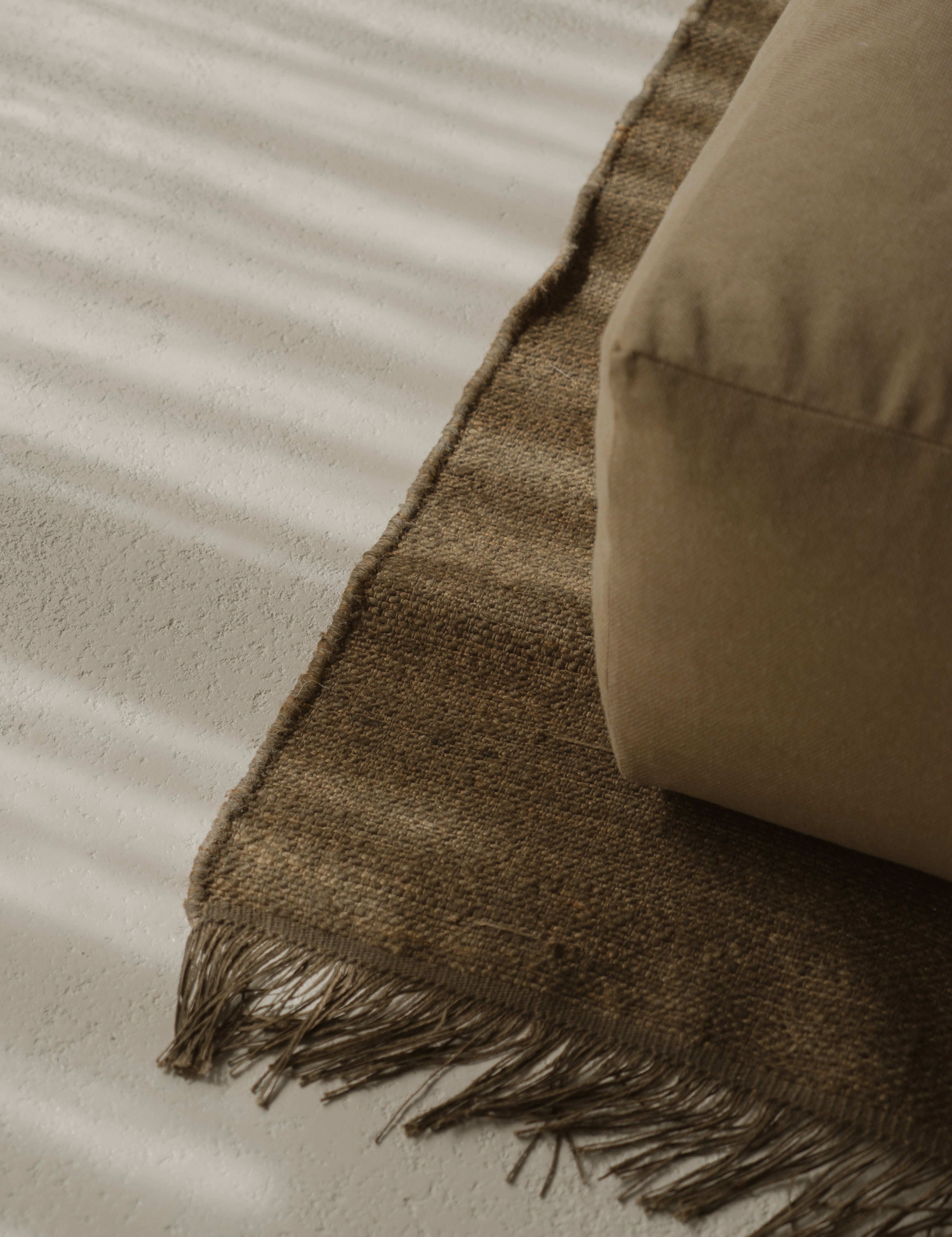 vloerkleed gemaakt van natuurlijke materialen van wol, linnen en jute