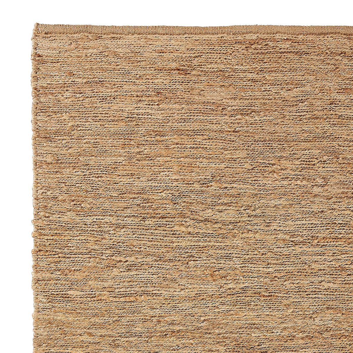 Detail van handgeweven jutevezels in het River vloerkleed – milieuvriendelijk design