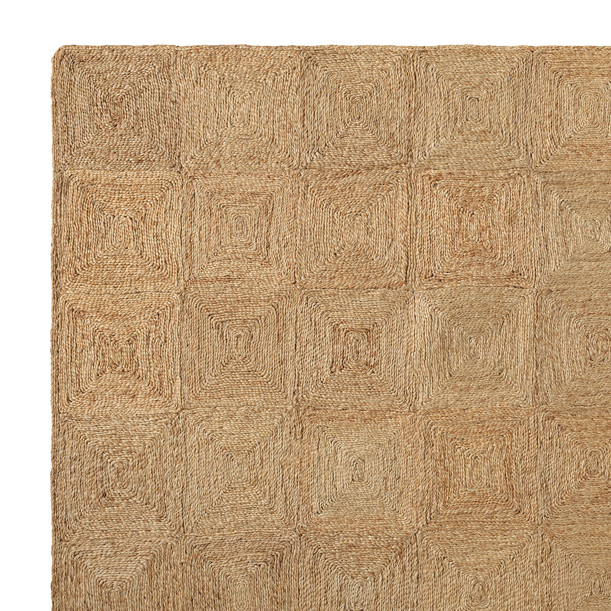 Detail van de handgecoilde jute structuur en gevlochten rand van het Sequoia vloerkleed