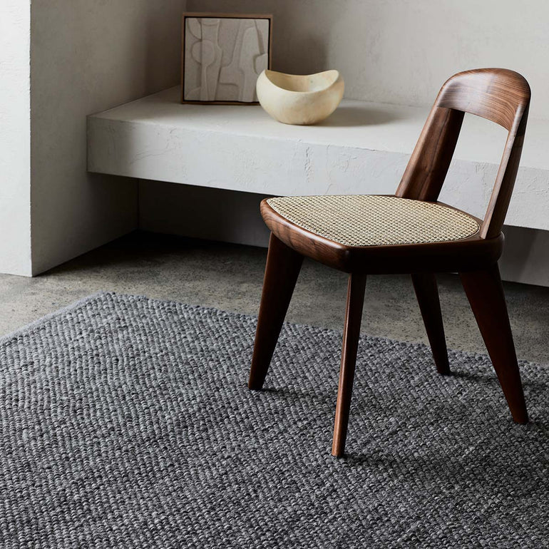 armadillo rug, stool and art