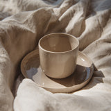 Ceramic cup sand