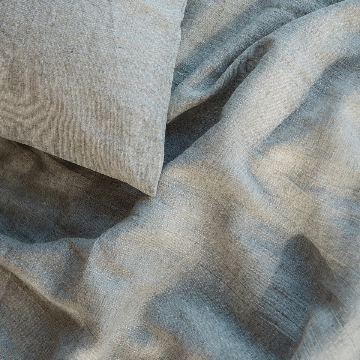 by molle linen bedding in sage, a soft grey green shade